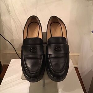 Delicate used Coach leah platform loafer Slip-On back heels show a little wear.